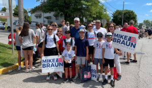 Mike Braun and supporters with signs